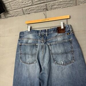 Lucky Brand Jeans Mens 36x32 Relaxed Fit Blue Denim "The Art Of Blue Jeans" Styl